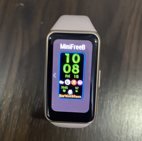 Tap and hold on the homescreen to highlight the current watch face, then scroll to select